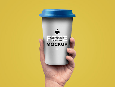 Coffee Cup In Hand Mockup